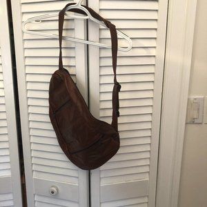 Mexican pear shaped leather shoulder bag, multiple compartments on face and on t